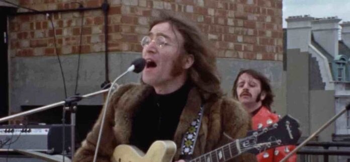 lennonliveguitarwide