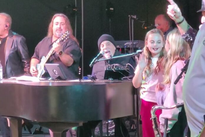 1-3-26 AN, Billy Joel, Wellington, Florida, With Billy Joel Cover Band, Surprise, 1-2-26, YT Screengrab, Cropped 3x2